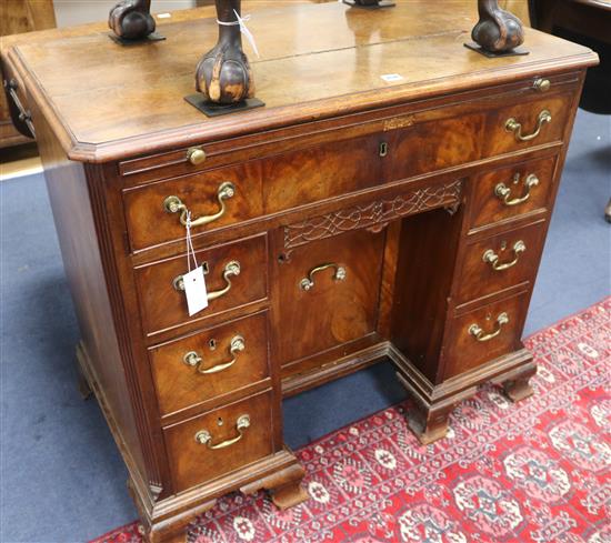 A George III mahogany kneehole dressing chest, W.95cm